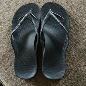 Archie’s flip flops